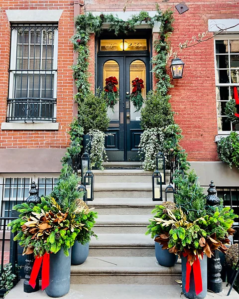 Getty Images Bronson loves strolling the Upper East Side to see the beautifully decorated door stoops (Credit: Getty Images)