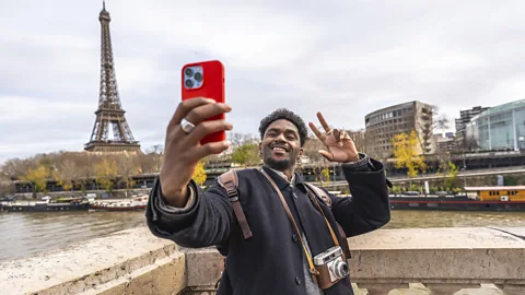 Alamy Governments around the world are increasingly monitoring travellers' social media activity (Credit: Alamy)