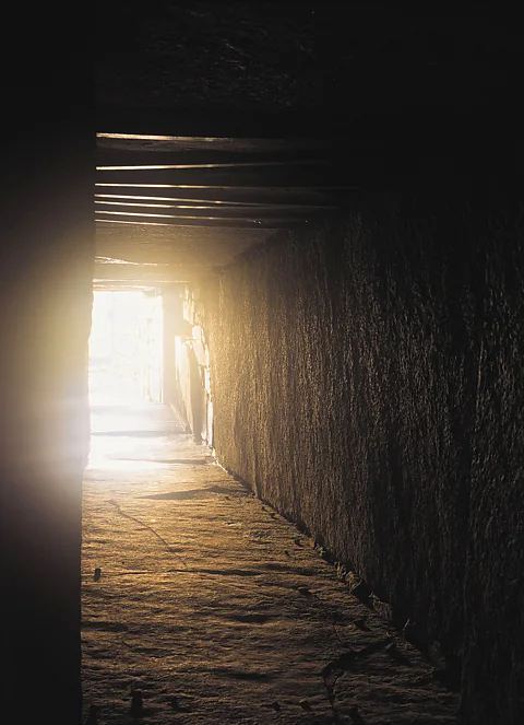 Alamy Orkney's Maeshowe tomb is a burial cairn created around 2800BC that conceals a stone-clad sepulchre (Credit: Alamy)