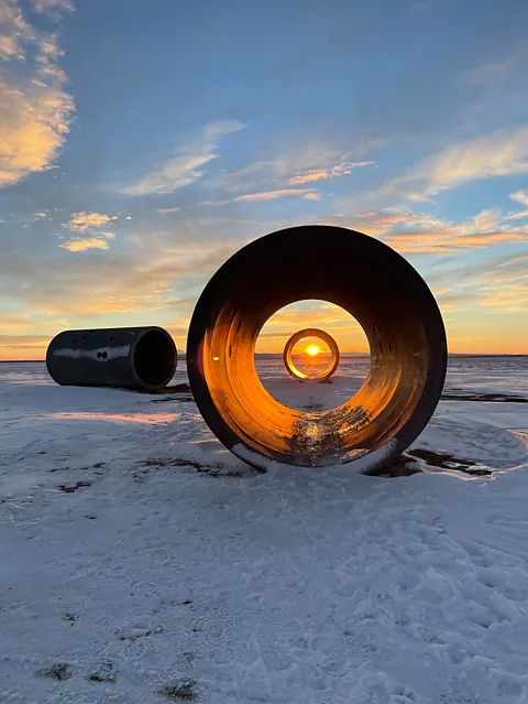 Natalie Rae Good Holt/ Smithson Foundation and Dia Art Foundation The view through Nancy Holt's Sun Tunnels in Utah perfectly frames the Sun as it rises and sets (Credit: Natalie Rae Good Holt/ Smithson Foundation and Dia Art Foundation)