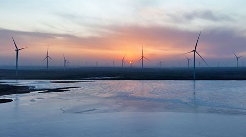 Wind turbines run at full capacity in the Gobi desert, China
