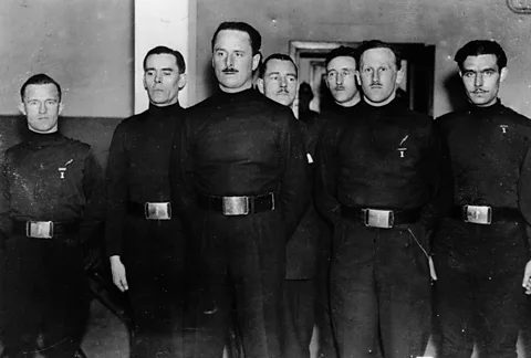 Getty Images William Joyce aka Lord Haw-Haw (far left) with the British Union of Fascists, led by Oswald Mosley (Credit: Getty Images)
