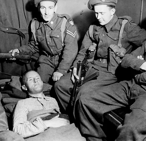 Getty Images Pictured here in captivity in May 1945, Lord Haw-Haw was later hanged for treason (Credit: Getty Images)