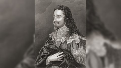 Një portret bardhë e zi i Mbretit Charles I. Ai rri ulur përballë dhe shikon nga e djathta dhe ka flokë të gjatë, mustaqe dhe mjekër të gjatë. Ai mban një pjesë të një manteli në krahun e djathtë dhe vesh një xhaketë të trashë me jakë të gjatë.
