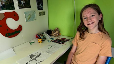 Home educated teenager Charles discussing creativity in his bedroom