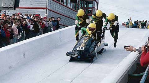 Jamaican bobsled team on a slope in 1988.