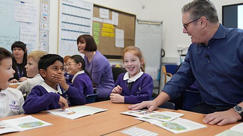 Sir Keir Starmer at a school with children.