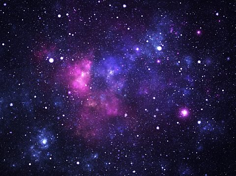 A view of a pink and purple galaxy in space