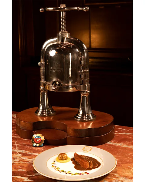 Adrien Privat The restaurant's Christofle duck press signals its commitment to classical French cooking (Credit: Adrien Privat)