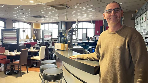 John Laurenson Mickael Moureaud at the restaurant he owns (Credit: John Laurenson)