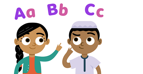 Isma and Amir point at upper and lower case letters.