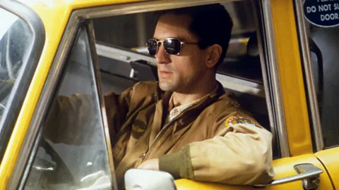 Alamy Robert De Niro in a taxi in a still from Taxi Driver (Credit: Alamy)