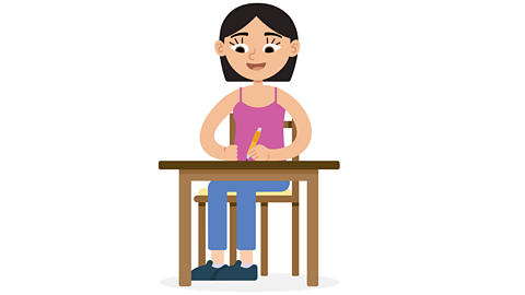 Girl writing at a desk