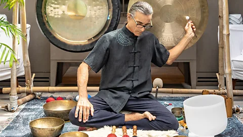 Le Barthelemy Hotel and Spa A man performing a sound bath (Credit: Le Barthelemy Hotel and Spa)