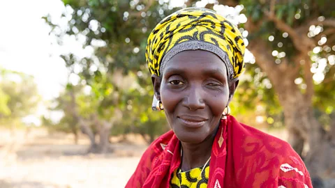 Lena Nian Nurse Senneh now cultivates far less rice on a smaller piece of land she owns and has to supplement this by buying imported rice (Credit: Lena Nian)