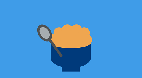 A blue background with a silver spoon and a yellow rice in a blue bowl