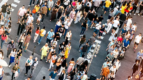 Getty Images Aerial view of crowds of people crossing the street in Madrid, Spain (Credit: Getty Images)