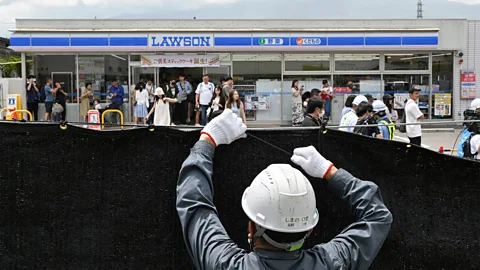 Getty Images The installation of a large mesh barrier to block an Instagram-famous view of Mount Fuji made headlines in 2024 (Credit: Getty Images)