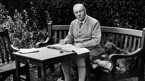 Sir Arthur Conan Doyle writing in his garden