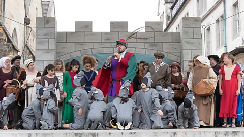 Hameln Marketing und Tourismus GmbH Hamelin's open-air Pied Piper play draws on a sinister 1284 event involving the disappearance of the town's children (Credit: Hameln Marketing und Tourismus GmbH)