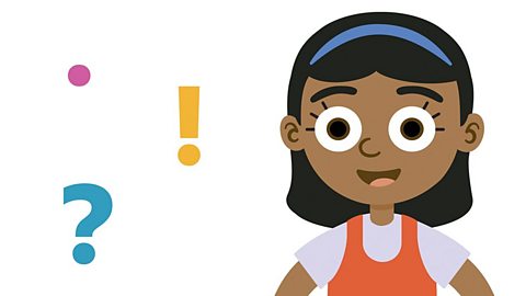 A girl learning about proofreading for the SEAG transfer test. To her left is a question mark, exclamation mark and full stop.