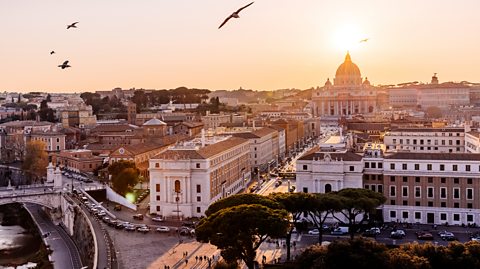 An overhead view of Vatican City and St Peter's Basilica at sunset