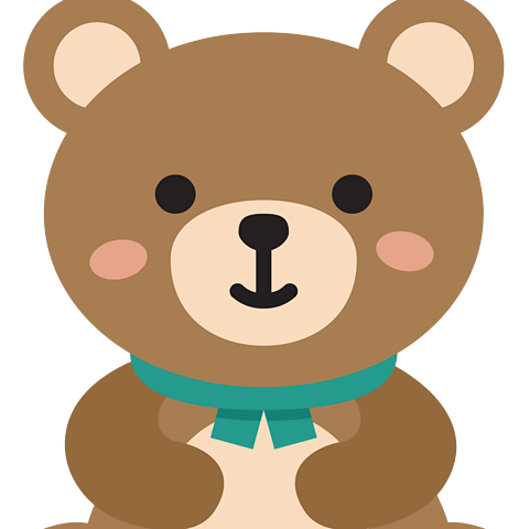 An image of a brown teddy, with green bow