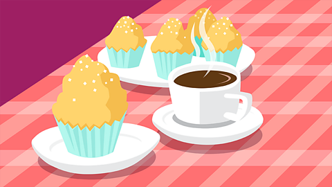 Spanish magdalenas and a cup of coffee on a table