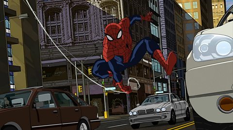 A Disney XD animation still of Spider-Man, who wears a red and navy blue superhero suit with black webs, swinging from a white web through New York City among the traffic
