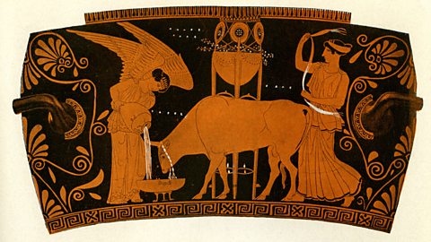 A picture on an old vase shows two people and a cow. One person is helping the cow drink water.