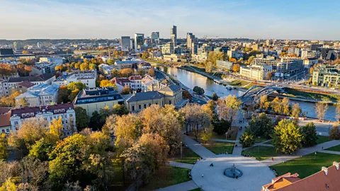 Getty Images Vilnius blends a Unesco-listed Old Town with extensive parks and riverside green spaces (Credit: Getty Images)
