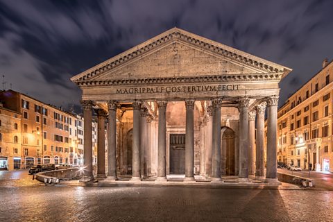 Stone temple with pillars in a square in Rome, Italy