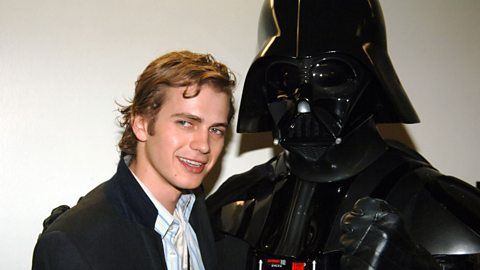 Hayden Christensen poses alongside Darth Vader