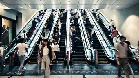 Getty Images Keeping to the correct side on a Japanese escalator depends on the city (Credit: Getty Images)
