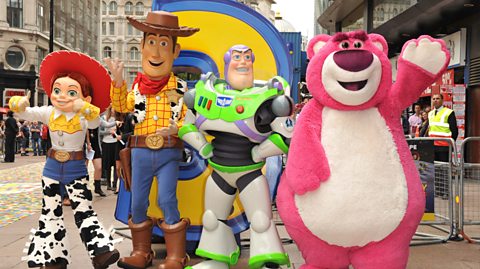 Lifesize Toy Story characters Jessie, Woody, Buzz Lightyear and Lotso. Jessie is a cowgirl, Woody is a cowboy sheriff, Buzz is a space ranger and Lotso is a big fluffy pink bear