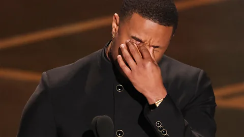 Getty Images Michael B Jordan gets emotional at the podium receiving his best actor award (Credit: Getty Images)