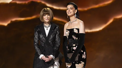 Getty Images Former Vogue editor Anna Wintour showed off her comic skills presenting with Anne Hathaway (Credit: Getty Images)
