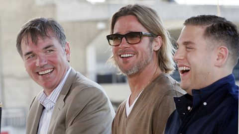 From left to right, Billy Beane, Brad Pitt and Jonah Hill all laughing