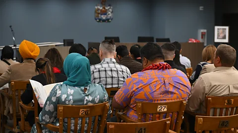 Getty Images Citizenship ceremonies are the final step in becoming Canadian, where applicants take an oath of citizenship (Credit: Getty Images)