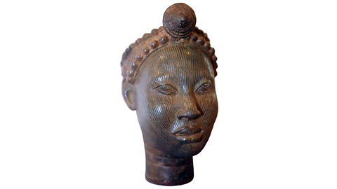 A photograph of a sculpted head.