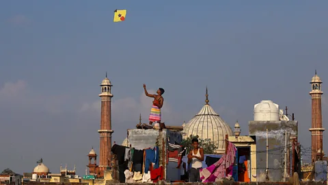 Vijay Pandey The sight of kites flying from the rooftops during festivals is a traditional sight in Delhi, but the numbers have dwindled over the years (Credit: Vijay Pandey)