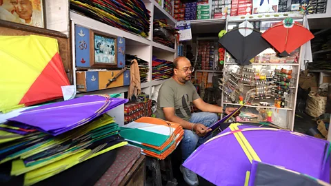 Vijay Pandey Himanshu Gupta is one of the few kite sellers left in the Lal Kuan market of Old Delhi as kite flying has been replaced with digital distractions (Credit: Vijay Pandey)