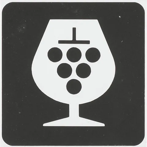 CNAP The early designs were simple pictograms, such as grapes in a Cognac glass to represent the famed spirits region (Credit: CNAP)