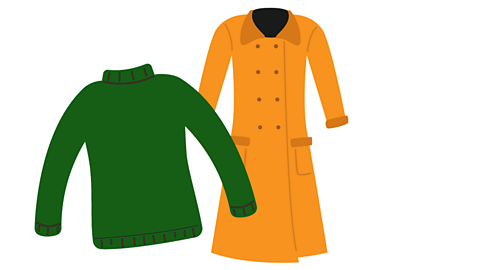 A green jumper and a long, orange coat.