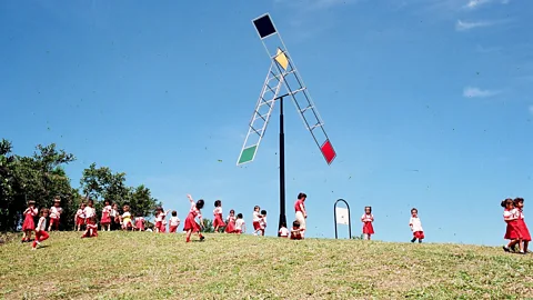 Gaviotas Children from Gaviotas playing near one of Gaviotas' ecological inventions (Credit: Gaviotas)
