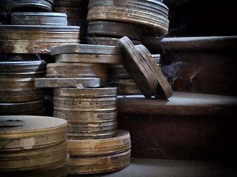 Film cans from the silent era illustrating the fragile nature of archive film