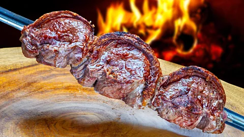 Alamy In Brazil, steak is an interactive, all-you-can eat event (Credit: Alamy)