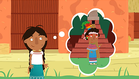 A Maya person in everyday clothing imagines a wealthier Maya person in more decorative colourful clothing. 