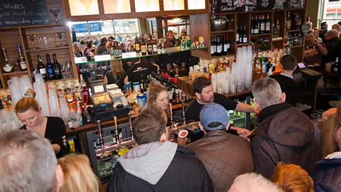 Alamy There may be no visible line, but bartenders are often working from an unspoken mental queue (Credit: Alamy)
