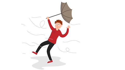A man is blown away by the wind as his umbrella turns inside out.